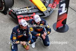 Race winner Max Verstappen (NLD) Red Bull Racing RB20 celebrates with second placed team mate Sergio Perez (MEX) Red Bull Racing in parc ferme. 07.04.2024. Formula 1 World Championship, Rd 4, Japanese Grand Prix, Suzuka, Japan, Race Day.