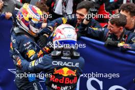Race winner Max Verstappen (NLD) Red Bull Racing celebrates with the team and second placed team mate Sergio Perez (MEX) Red Bull Racing in parc ferme. 07.04.2024. Formula 1 World Championship, Rd 4, Japanese Grand Prix, Suzuka, Japan, Race Day.