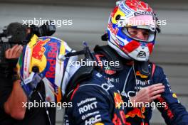Race winner Max Verstappen (NLD) Red Bull Racing with second placed team mate Sergio Perez (MEX) Red Bull Racing in parc ferme. 07.04.2024. Formula 1 World Championship, Rd 4, Japanese Grand Prix, Suzuka, Japan, Race Day.