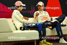 (L to R): Max Verstappen (NLD) Red Bull Racing and team mate Sergio Perez (MEX) Red Bull Racing, in the post race FIA Press Conference. 07.04.2024. Formula 1 World Championship, Rd 4, Japanese Grand Prix, Suzuka, Japan, Race Day.