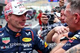 Race winner Max Verstappen (NLD) Red Bull Racing with Christian Horner (GBR) Red Bull Racing Team Principal in parc ferme. 07.04.2024. Formula 1 World Championship, Rd 4, Japanese Grand Prix, Suzuka, Japan, Race Day.
