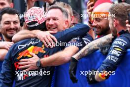 Sergio Perez (MEX) Red Bull Racing celebrates his second position with Christian Horner (GBR) Red Bull Racing Team Principal in parc ferme. 07.04.2024. Formula 1 World Championship, Rd 4, Japanese Grand Prix, Suzuka, Japan, Race Day.