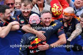 Second placed Sergio Perez (MEX) Red Bull Racing celebrates with Christian Horner (GBR) Red Bull Racing Team Principal and the team in parc ferme. 07.04.2024. Formula 1 World Championship, Rd 4, Japanese Grand Prix, Suzuka, Japan, Race Day.