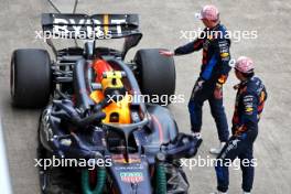 Race winner Max Verstappen (NLD) Red Bull Racing RB20 with second placed team mate Sergio Perez (MEX) Red Bull Racing in parc ferme. 07.04.2024. Formula 1 World Championship, Rd 4, Japanese Grand Prix, Suzuka, Japan, Race Day.