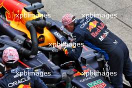Race winner Max Verstappen (NLD) Red Bull Racing RB20 with second placed team mate Sergio Perez (MEX) Red Bull Racing in parc ferme. 07.04.2024. Formula 1 World Championship, Rd 4, Japanese Grand Prix, Suzuka, Japan, Race Day.