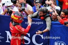 Carlos Sainz Jr (ESP) Ferrari celebrates his third position with the team in parc ferme. 07.04.2024. Formula 1 World Championship, Rd 4, Japanese Grand Prix, Suzuka, Japan, Race Day.