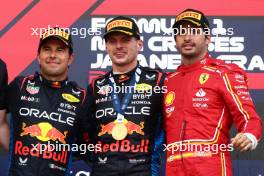 1st place Max Verstappen (NLD) Red Bull Racing RB20, 2nd place Sergio Perez (MEX) Red Bull Racing RB20 and 3rd place Carlos Sainz Jr (ESP) Ferrari. 07.04.2024. Formula 1 World Championship, Rd 4, Japanese Grand Prix, Suzuka, Japan, Race Day.