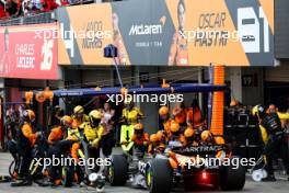 Oscar Piastri (AUS) McLaren MCL38 makes a pit stop. 07.04.2024. Formula 1 World Championship, Rd 4, Japanese Grand Prix, Suzuka, Japan, Race Day.