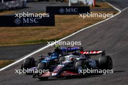Kevin Magnussen (DEN) Haas VF-24 and Pierre Gasly (FRA) Alpine F1 Team A524 battle for position. 07.04.2024. Formula 1 World Championship, Rd 4, Japanese Grand Prix, Suzuka, Japan, Race Day.