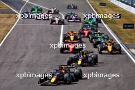 Max Verstappen (NLD) Red Bull Racing RB20 leads at the start of the race. 07.04.2024. Formula 1 World Championship, Rd 4, Japanese Grand Prix, Suzuka, Japan, Race Day.