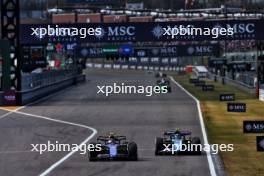 Logan Sargeant (USA) Williams Racing FW46 and Pierre Gasly (FRA) Alpine F1 Team A524 battle for position. 07.04.2024. Formula 1 World Championship, Rd 4, Japanese Grand Prix, Suzuka, Japan, Race Day.