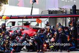 Sergio Perez (MEX) Red Bull Racing RB20 makes a pit stop. 07.04.2024. Formula 1 World Championship, Rd 4, Japanese Grand Prix, Suzuka, Japan, Race Day.