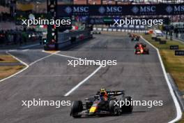 Sergio Perez (MEX) Red Bull Racing RB20.  07.04.2024. Formula 1 World Championship, Rd 4, Japanese Grand Prix, Suzuka, Japan, Race Day.