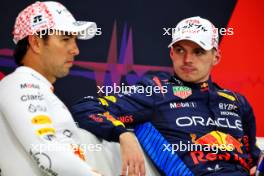 (L to R): Sergio Perez (MEX) Red Bull Racing and team mate Max Verstappen (NLD) Red Bull Racing in the post qualifying FIA Press Conference. 06.04.2024. Formula 1 World Championship, Rd 4, Japanese Grand Prix, Suzuka, Japan, Qualifying Day.