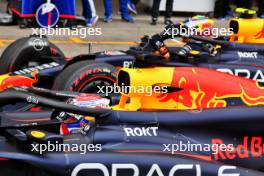 Pole sitter Max Verstappen (NLD) Red Bull Racing RB20 and team mate Sergio Perez (MEX) Red Bull Racing RB20 in qualifying parc ferme. 06.04.2024. Formula 1 World Championship, Rd 4, Japanese Grand Prix, Suzuka, Japan, Qualifying Day.
