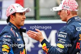 (L to R): Second placed Sergio Perez (MEX) Red Bull Racing with team mate and pole sitter Max Verstappen (NLD) Red Bull Racing in qualifying parc ferme. 06.04.2024. Formula 1 World Championship, Rd 4, Japanese Grand Prix, Suzuka, Japan, Qualifying Day.