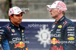 Sergio Perez (MEX), Red Bull Racing and Max Verstappen (NLD), Red Bull Racing  06.04.2024. Formula 1 World Championship, Rd 4, Japanese Grand Prix, Suzuka, Japan, Qualifying Day.