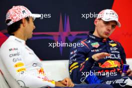 (L to R): Sergio Perez (MEX) Red Bull Racing and team mate Max Verstappen (NLD) Red Bull Racing in the post qualifying FIA Press Conference. 06.04.2024. Formula 1 World Championship, Rd 4, Japanese Grand Prix, Suzuka, Japan, Qualifying Day.