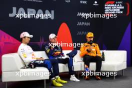 (L to R): Sergio Perez (MEX) Red Bull Racing; Max Verstappen (NLD) Red Bull Racing; and Lando Norris (GBR) McLaren, in the post qualifying FIA Press Conference. 06.04.2024. Formula 1 World Championship, Rd 4, Japanese Grand Prix, Suzuka, Japan, Qualifying Day.