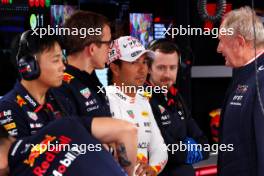 Sergio Perez (MEX) Red Bull Racing with Hugh Bird (GBR) Red Bull Racing Engineer and Dr Helmut Marko (AUT) Red Bull Motorsport Consultant. 06.04.2024. Formula 1 World Championship, Rd 4, Japanese Grand Prix, Suzuka, Japan, Qualifying Day.