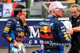 Sergio Perez (MEX) Red Bull Racing and team mate Max Verstappen (NLD) Red Bull Racing in qualifying parc ferme. 06.04.2024. Formula 1 World Championship, Rd 4, Japanese Grand Prix, Suzuka, Japan, Qualifying Day.