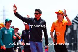 (L to R): Esteban Ocon (FRA) Alpine F1 Team and Oscar Piastri (AUS) McLaren on the drivers' parade. 07.04.2024. Formula 1 World Championship, Rd 4, Japanese Grand Prix, Suzuka, Japan, Race Day.