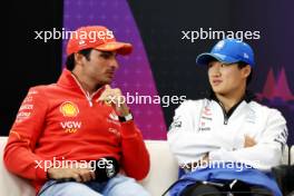 (L to R): Carlos Sainz Jr (ESP) Ferrari and Yuki Tsunoda (JPN) RB in the FIA Press Conference. 04.04.2024. Formula 1 World Championship, Rd 4, Japanese Grand Prix, Suzuka, Japan, Preparation Day.