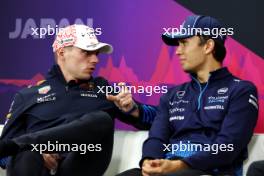(L to R): Max Verstappen (NLD) Red Bull Racing and Alexander Albon (THA) Williams Racing in the FIA Press Conference. 04.04.2024. Formula 1 World Championship, Rd 4, Japanese Grand Prix, Suzuka, Japan, Preparation Day.