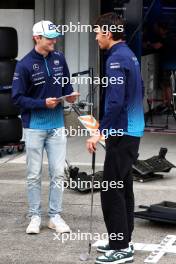 (L to R): Logan Sargeant (USA) Williams Racing with team mate Alexander Albon (THA) Williams Racing. 04.04.2024. Formula 1 World Championship, Rd 4, Japanese Grand Prix, Suzuka, Japan, Preparation Day.