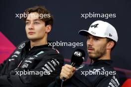 Pierre Gasly (FRA) Alpine F1 Team and George Russell (GBR) Mercedes AMG F1 in the FIA Press Conference. 04.04.2024. Formula 1 World Championship, Rd 4, Japanese Grand Prix, Suzuka, Japan, Preparation Day.