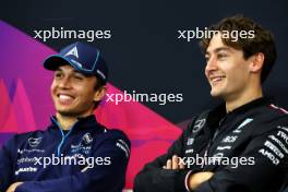 (L to R): Alexander Albon (THA) Williams Racing and George Russell (GBR) Mercedes AMG F1 in the FIA Press Conference. 04.04.2024. Formula 1 World Championship, Rd 4, Japanese Grand Prix, Suzuka, Japan, Preparation Day.