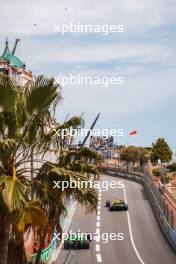 Valtteri Bottas (FIN) Sauber C44 and Oscar Piastri (AUS) McLaren MCL38. 24.05.2024. Formula 1 World Championship, Rd 8, Monaco Grand Prix, Monte Carlo, Monaco, Practice Day.