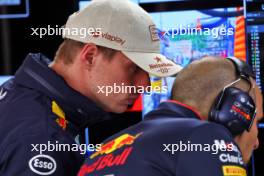 Max Verstappen (NLD) Red Bull Racing with Gianpiero Lambiase (ITA) Red Bull Racing Engineer. 24.05.2024. Formula 1 World Championship, Rd 8, Monaco Grand Prix, Monte Carlo, Monaco, Practice Day.