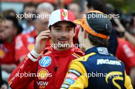(L to R): race winner Charles Leclerc (MON) Ferrari with Oscar Piastri (AUS) McLaren in parc ferme. 26.05.2024. Formula 1 World Championship, Rd 8, Monaco Grand Prix, Monte Carlo, Monaco, Race Day.