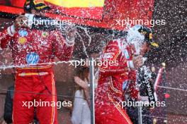 Race winner Charles Leclerc (MON) Ferrari celebrates on the podium with third placed team mate Carlos Sainz Jr (ESP) Ferrari. 26.05.2024. Formula 1 World Championship, Rd 8, Monaco Grand Prix, Monte Carlo, Monaco, Race Day.