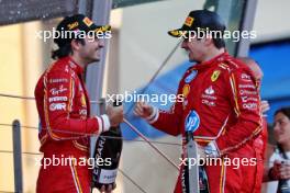(L to R): Carlos Sainz Jr (ESP) Ferrari celebrates his third position on the podium with team mate and race winner Charles Leclerc (MON) Ferrari. 26.05.2024. Formula 1 World Championship, Rd 8, Monaco Grand Prix, Monte Carlo, Monaco, Race Day.