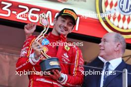(L to R): Race winner Charles Leclerc (MON) Ferrari celebrates on the podium with HSH Prince Albert of Monaco (MON). 26.05.2024. Formula 1 World Championship, Rd 8, Monaco Grand Prix, Monte Carlo, Monaco, Race Day.