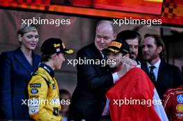 Race winner Charles Leclerc (MON) Ferrari celebrates on the podium with HSH Prince Albert of Monaco (MON). 26.05.2024. Formula 1 World Championship, Rd 8, Monaco Grand Prix, Monte Carlo, Monaco, Race Day.