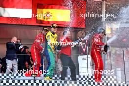 The podium: Frederic Vasseur (FRA) Ferrari Team Principal; Oscar Piastri (AUS) McLaren, second; Charles Leclerc (MON) Ferrari, race winner; Carlos Sainz Jr (ESP) Ferrari, third. HSH Prince Albert of Monaco (MON) (Left) sprays the champagne too. 26.05.2024. Formula 1 World Championship, Rd 8, Monaco Grand Prix, Monte Carlo, Monaco, Race Day.
