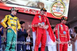 The podium (L to R): Oscar Piastri (AUS) McLaren, second; Charles Leclerc (MON) Ferrari, race winner; Carlos Sainz Jr (ESP) Ferrari, third. 26.05.2024. Formula 1 World Championship, Rd 8, Monaco Grand Prix, Monte Carlo, Monaco, Race Day.