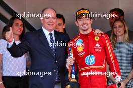 (L to R): HSH Prince Albert of Monaco (MON) celebrates on the podium with race winner Charles Leclerc (MON) Ferrari. 26.05.2024. Formula 1 World Championship, Rd 8, Monaco Grand Prix, Monte Carlo, Monaco, Race Day.