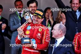 (L to R): Race winner Charles Leclerc (MON) Ferrari celebrates with HSH Prince Albert of Monaco (MON) on the podium. 26.05.2024. Formula 1 World Championship, Rd 8, Monaco Grand Prix, Monte Carlo, Monaco, Race Day.
