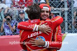 Third placed Carlos Sainz Jr (ESP) Ferrari (Right) celebrates with team mate and race winner Charles Leclerc (MON) Ferrari in parc ferme. 26.05.2024. Formula 1 World Championship, Rd 8, Monaco Grand Prix, Monte Carlo, Monaco, Race Day.