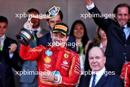 (L to R): Race winner Charles Leclerc (MON) Ferrari celebrates with HSH Prince Albert of Monaco (MON) on the podium. 26.05.2024. Formula 1 World Championship, Rd 8, Monaco Grand Prix, Monte Carlo, Monaco, Race Day.