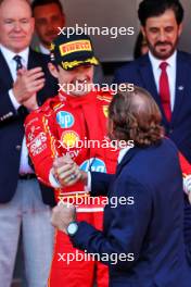 Race winner Charles Leclerc (MON) Ferrari celebrates with Andrea Casiraghi (MON) on the podium. 26.05.2024. Formula 1 World Championship, Rd 8, Monaco Grand Prix, Monte Carlo, Monaco, Race Day.