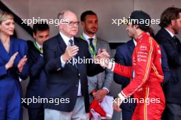 (L to R): Princess Charlene of Monaco and HSH Prince Albert of Monaco (MON) celebrate with third placed Carlos Sainz Jr (ESP) Ferrari on the podium. 26.05.2024. Formula 1 World Championship, Rd 8, Monaco Grand Prix, Monte Carlo, Monaco, Race Day.
