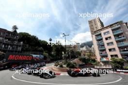 Max Verstappen (NLD) Red Bull Racing RB20 leads Lewis Hamilton (GBR) Mercedes AMG F1 W15 at the start of the race. 26.05.2024. Formula 1 World Championship, Rd 8, Monaco Grand Prix, Monte Carlo, Monaco, Race Day.