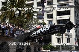 The Haas VF-24 of Kevin Magnussen (DEN) Haas F1 Team is craned from the circuit after the race stopping start crash. 26.05.2024. Formula 1 World Championship, Rd 8, Monaco Grand Prix, Monte Carlo, Monaco, Race Day.
