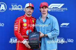 (L to R): Charles Leclerc (MON) Ferrari receives the Pirelli Pole Position Award from Nicholas Galitzine (GBR) Actor in qualifying parc ferme.   25.05.2024. Formula 1 World Championship, Rd 8, Monaco Grand Prix, Monte Carlo, Monaco, Qualifying Day.