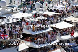 Circuit atmosphere - fans on boats in the scenic Monaco Harbour. 25.05.2024. Formula 1 World Championship, Rd 8, Monaco Grand Prix, Monte Carlo, Monaco, Qualifying Day.